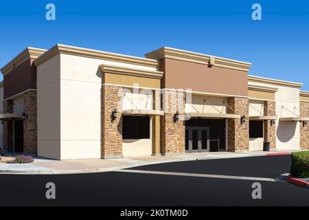 New commercial retail office building with blue sky Stock Photo