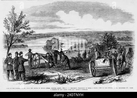 View of the Potomac River, near the mouth of Seneca Creek, Colonel Ledew, 34th New York Regiment, preparing to shell a Rebel camp on the opposite bank, September 27th, 1861. 19th century American Civil War illustration from Frank Leslie's Illustrated Newspaper Stock Photo