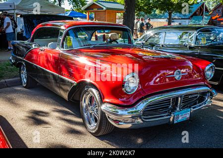 Falcon Heights, MN - June 18, 2022: High perspective front corner view of a 1956 Oldsmobile Super 88 Holiday Sedan at a local car show. Stock Photo