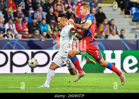 Pilsen, Czech Republic. 13th Sep, 2022. From left soccer players Lautaro Martenez of Inter Milan and Lukas Hejda of Viktoria Plzen in action during the Viktoria Plzen vs Inter Milan, 2nd round of group C of football Champions' League match in Pilsen, Czech Republic, September 13, 2022. Credit: Miroslav Chaloupka/CTK Photo/Alamy Live News Stock Photo