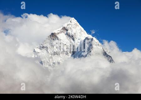 Mount Ama Dablam within clouds, way to Everest base camp, Khumbu valley, Solukhumbu Sagarmatha national park, Everest area, nepalese himalayas, Nepal Stock Photo