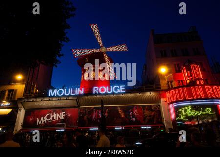 Paris, France - July, 15: Cabaret Moulin Rouge in the Night Time in Paris on July 15, 2022 Stock Photo