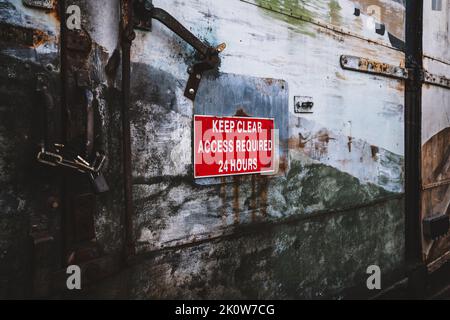 Keep clear, access required 24 hours Stock Photo