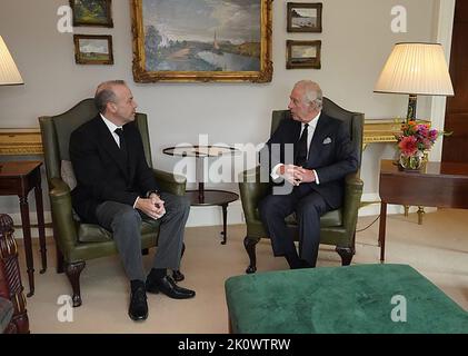 Britain's King Charles III (R) speaks with Britain's Northern Ireland Secretary Chris Heaton-Harris during an audience at Hillsborough Castle in Belfast Tuesday on September 13, 2022, during his visit to Northern Ireland. King Charles III travelled to Belfast where he is set to receive tributes from pro-UK parties and the respectful sympathies of nationalists who nevertheless can see reunification with Ireland drawing closer. Photo by WPA Pool/ Royal Family/UPI. Credit: UPI/Alamy Live News