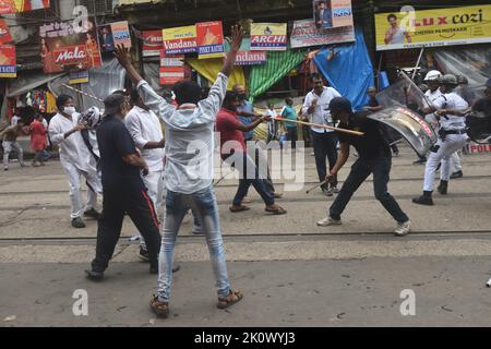 Kolkata, India. 13th Sep, 2022. Integrants of the Bharatiya Janata Party take part during a protest. BJP Demonstrators confront Police Personals and also torched a Kolkata Police Vehicle during the riots. on September 13, 2022 in Kolkata, India. (Credit Image: © Sukhomoy  Sen Eyepix Group/eyepix via ZUMA Press Wire) Credit: ZUMA Press, Inc./Alamy Live News Stock Photo