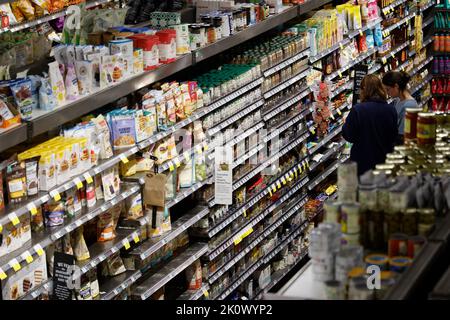 Washington, USA. 13th Sep, 2022. People shop at a local supermarket in Washington, DC, the United States, Sept. 13, 2022. The U.S. Labor Department reported Tuesday the country's consumer inflation in August surged 8.3 percent from a year ago, slightly down from the previous month but still at an elevated level, warranting another big rate hike by the Federal Reserve. Credit: Ting Shen/Xinhua/Alamy Live News Stock Photo