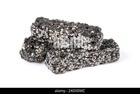 Bars with black sesame seeds isolated on white background Stock Photo