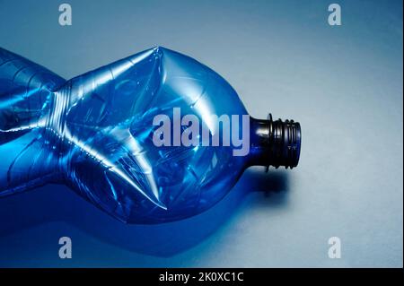 empty blue plastic bottle, recycling concept Stock Photo