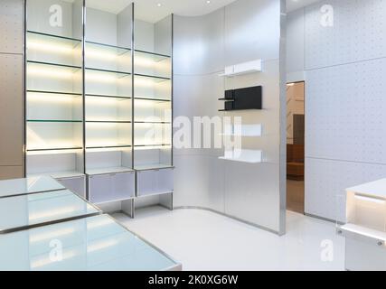 Interior of empty store with shelves Stock Photo