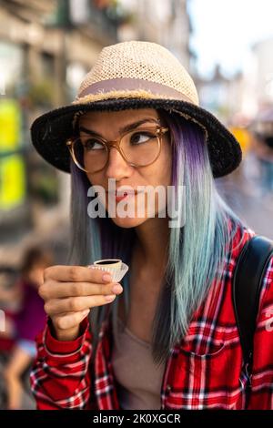 Tourist drink ginja - traditional portuguese cherry liqueur Stock Photo