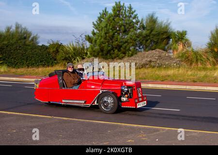 1981, 80s, eighties French  Red CITROEN 2 CV 602cc three-wheeled trike Petrol, hand-built vehicles, kits, replica, hatchback, SUV, kit car, kit cars, amateur car, replicas moving, being driven, in motion, travelling to the classic and Speed event in Southport, UK Stock Photo