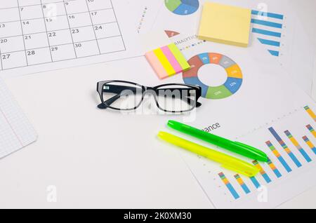 Business background. Financial analysis, accounting, statistics, investment, sales analysis. Working set for analyzing statistics. Charts and graph wi Stock Photo