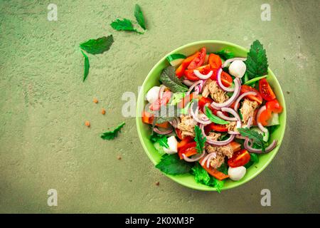 Tuna salad with mozzarella, onions and Japanese mustard greens, mizuna and tatsoi Stock Photo