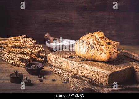 Fresh baked organic spelt flour bread with seeds. Healthy food concept Stock Photo