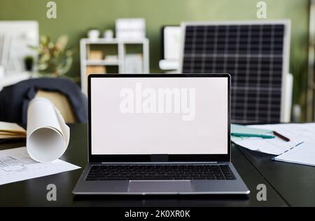 Close-up of laptop with empty display on table of business person at office Stock Photo