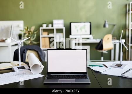 Horizontal image of laptop with empty display on table of architect at modern office Stock Photo