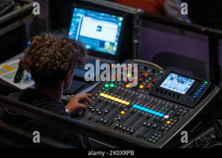 Telecommunication engineer using control panel Stock Photo