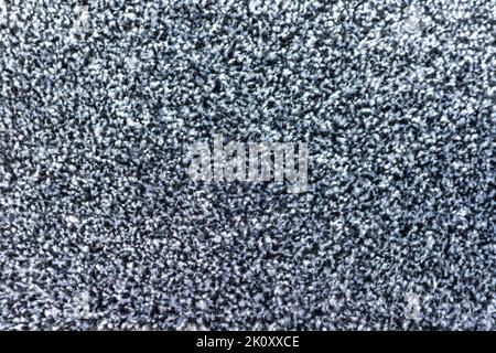 Black and grey carpet texture background closeup view Stock Photo