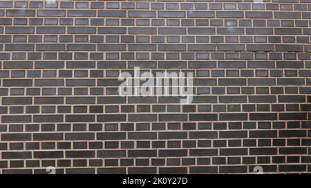 Dark clinker brick wall background Stock Photo