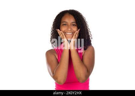 Strong healthy straight white teeth. Close up portrait of happy beautiful teenager girl wearing pink t-shirt over blue background Stock Photo