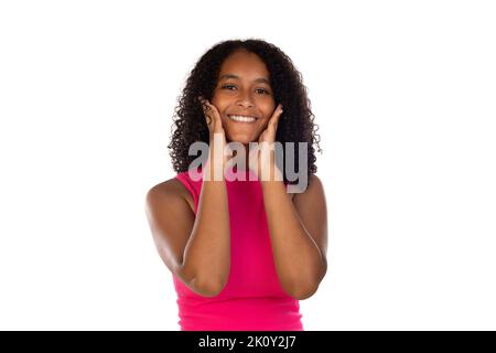 Strong healthy straight white teeth. Close up portrait of happy beautiful teenager girl wearing pink t-shirt over blue background Stock Photo