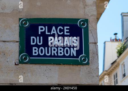 Traditional Parisian street plate that reads 'Place du Palais Bourbon' at the rear of the French National Assembly in Paris, France Stock Photo