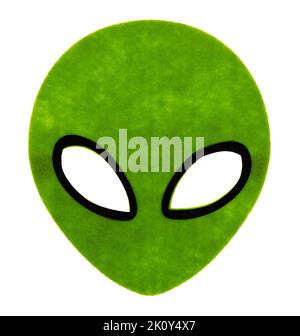 Oval shaped green and black alien mask isolated on a white background. Stock Photo