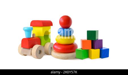 Colorful wooden Toys train, pyramid and colored cubes isolated on white background Stock Photo