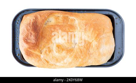 Top view of a small loaf of homemade bread isolated on a white background. Stock Photo