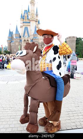 Urayasu, Japan. 14th Sep, 2022. A visitor dressed in costume from Disney character poses for photo at the Tokyo Disneyland in Urayasu, suburban Tokyo on Wednesday, September 14, 2022. Tokyo's Disney theme park runs Halloween events until October 31 with visitors welcomed to dress up in Disney related costumes at the park. Credit: Yoshio Tsunoda/AFLO/Alamy Live News Stock Photo