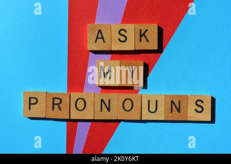 Ask My Pronouns, words in wooden alphabet letters isolated on colourful background Stock Photo