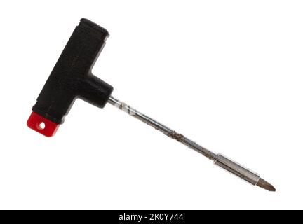 Old t handle screwdriver with Phillips bit isolated on a white background. Stock Photo