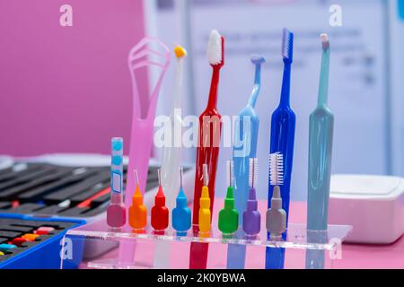 Dental oral care kit - toothbrushes, tongue scrapers, interspace brushes Stock Photo