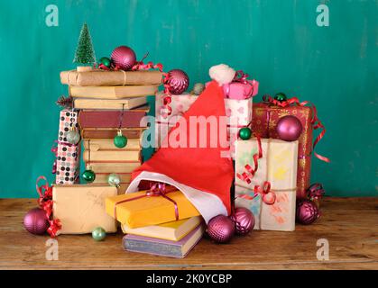 books as christmas gift,christmas present,reading,literature,education, holiday, concept.Christmas tree,decoration and christmas balls Stock Photo