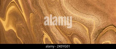 Abstract fluid art background dark golden and copper colors. Liquid marble. Acrylic painting on canvas with brown lines and gradient. Alcohol ink back Stock Photo
