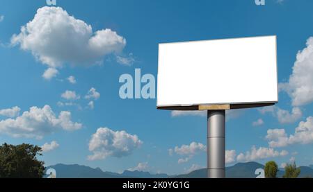 Blank billboard with empty screen over blue sky cloud background. For advertisement design or text. mockup template Stock Photo