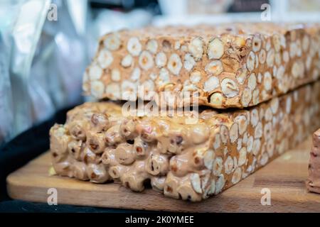 Sherbet with nuts on counter at summer local food market Stock Photo