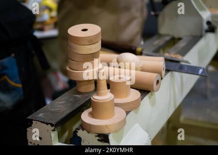 Handmade carved wooden details, decor on wood lathe Stock Photo