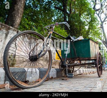 April 13th 2022, Dehradun City Uttarakhand India. A close up shot of a tri cycle used by sanitary workers for transporting roadside garbage in the cit Stock Photo