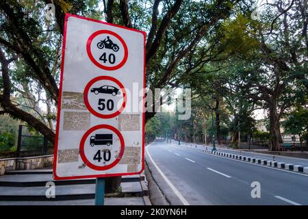 Maximum Speed Limit sign board for different kinds of vehicle on National Highway Rajpur road. Dehradun city of Uttarakhand, India. Stock Photo