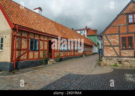 Ystad, Sweden 13 Sep, 2022: Street and half timbered house with the entrance to the house Stock Photo