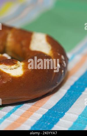 salted pretzel on napkin Stock Photo