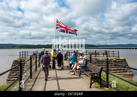 Mourning Queen Elizabeth II, Arnside, Milnthorpe, Cumbria, UK The Union Flag at half-mast on the pier at Arnside, Milnthorpe, Cumbria, UK Credit: John Eveson/Alamy Live News Stock Photo