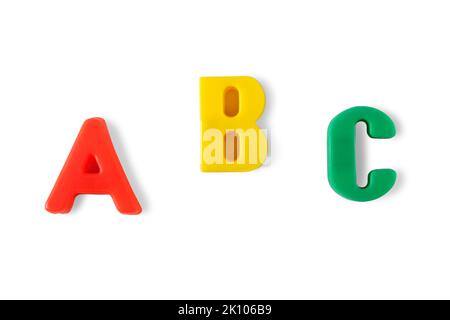 Multicolored plastic letters A, B and C isolated on white background Stock Photo