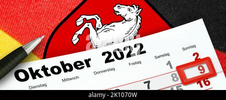 German calendar 2022  October 9   Sunday and emblem of Lower Saxony   Tuesday Wednesday Thursday Friday Saturday Stock Photo