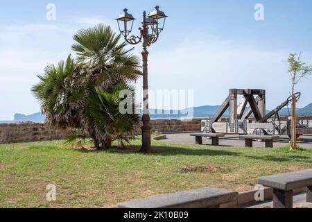 Ancient catapult on the ramparts of the old town of Alghero, Sardinia, Italy Stock Photo