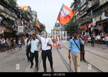 (9/13/2022) Hundreds of BJP (Bharatiya Janata Party) supporters from across West Bengal arrived in Kolkata and neighbouring Howrah this morning to take part in the 'Nabanna Abhijan' or march to secretariat. Several BJP leaders in West Bengal, including Leader of the Opposition Suvendu Adhikari, were detained by the police today when they were marching to the state secretariat 'Nabanna' in Kolkata, as part of a huge protest over alleged corruption by the ruling Trinamool Congress government.  Several BJP workers were detained by the police following the clashes. Party workers were taken into pr Stock Photo