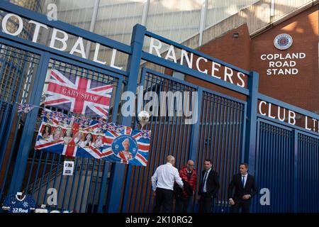 Glasgow, Scotland, 14 September 2022 Flags as marks of respect to Her Majesty Queen Elizabeth II who has died aged 96yrs, on the gates of Rangers FC’s Ibrox Stadium, in Glasgow, Scotland, 14 September 2022. Photo credit: Jeremy Sutton-Hibbert/Alamy Live News. Stock Photo