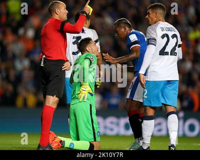 Rangers' Alfredo Morelos pleads with Napoli goalkeeper Alex Meret after receiving a yellow card during the UEFA Champions League Group A match at Ibrox Stadium, Glasgow. Picture date: Wednesday September 14, 2022. Stock Photo