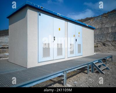 Electric transformer substation at construction site Stock Photo